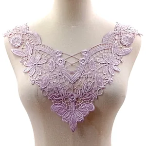 Detailed view of the lavender water-soluble lace embroidery collar on a mannequin torso.