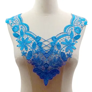 Detailed view of bright blue water-soluble lace collar with 3D floral embroidery