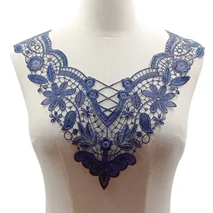 Detail view of blue floral water-soluble lace embroidered collar on mannequin