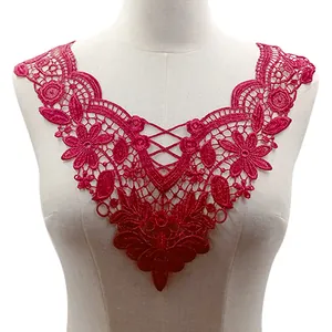 Detail view of magenta water-soluble lace floral collar for DIY sewing projects.