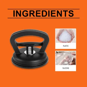 Black car dent repair suction cup tool with silicone and plastic material details.