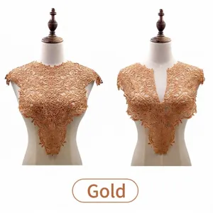 Detailed view of gold water-soluble lace collar with 3D embroidery displayed on mannequins