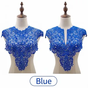 Detailed view of royal blue water-soluble lace collar embroidery on mannequin torso