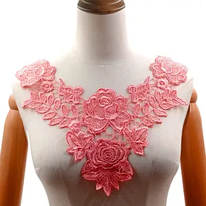 Close-up detail of pink floral water-soluble lace embroidery collar for DIY sewing projects