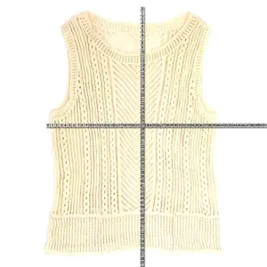 Detailed measurement showing the length and width of the beige knit vest.