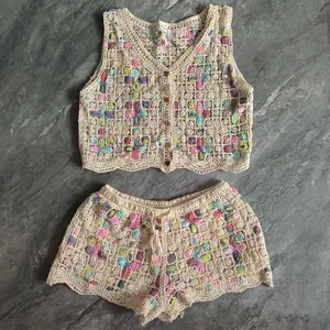 Bohemian crochet knit two-piece set featuring a colorful floral vest and shorts