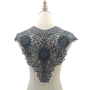 Intricate black lace hollow floral embroidery detail on a detachable collar capelet