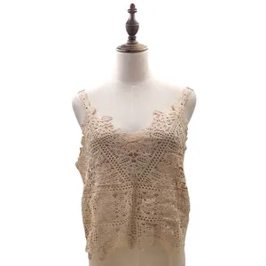 Detailed view of apricot water-soluble lace vest with delicate embroidery pattern