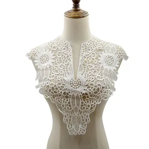 Exquisite close-up of white floral lace embroidery on a stylish detachable fake collar