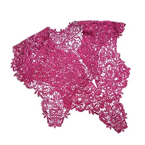 Detailed close-up of a magenta lace fake collar with intricate floral embroidery
