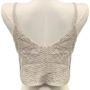 Detailed back view of a beige cotton crocheted lace camisole with elegant V-neckline