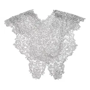 Detailed close-up view of an intricate silver lace embroidered hollow detachable collar.