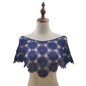 Elegant navy blue floral lace crochet shawl capelet shown in detail on a mannequin