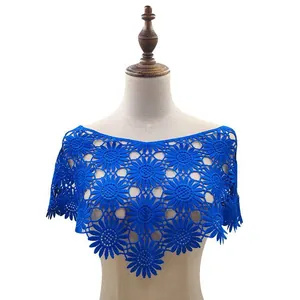 Detailed view of blue floral lace crochet shawl with intricate hollow-out pattern