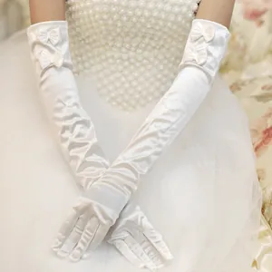 Elegant long white satin bridal gloves featuring exquisite double bow details for brides