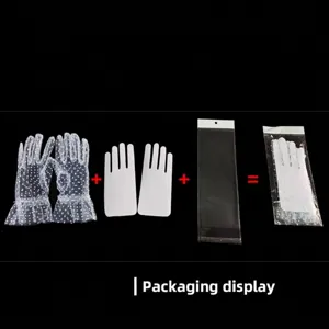 Elegant white lace mesh gloves with polka dots for women shown with product packaging display