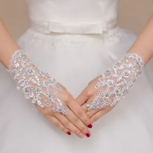 Elegant white lace fingerless wedding gloves with rhinestone and sequin detailing