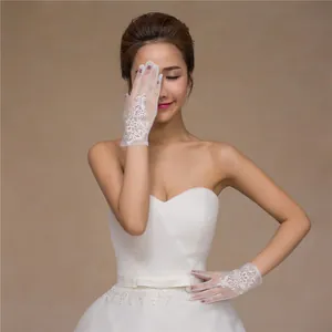 Elegant sheer white lace bridal gloves with intricate floral embroidery for wedding
