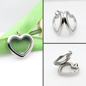 Detailed views showing the opening mechanism of the heart-shaped stainless steel glass locket