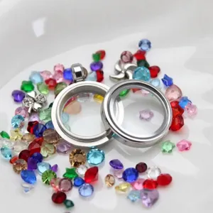 Close-up of 20mm round stainless steel photo locket pendants with colorful star gems