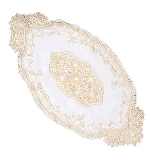 Detailed close-up view of an elegant French style embroidered lace floral placemat