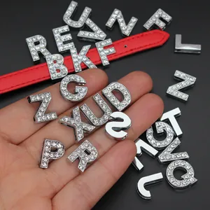 Detail view of 10mm rhinestone-encrusted zinc alloy alphabet slide charms for DIY jewelry