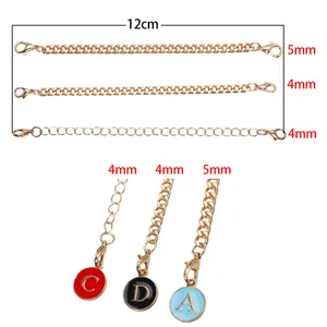 Gold chain extension with lobster clasps and round alphabet letter charms
