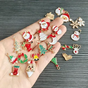 Detailed view of various colorful Christmas alloy enamel charms for DIY jewelry making accessories.