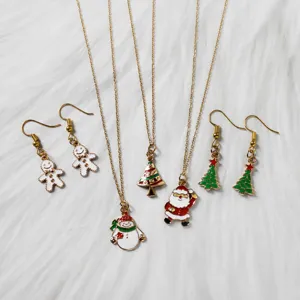 Detailed selection of festive enamel alloy charms with Santa Claus, Snowman and holiday icons