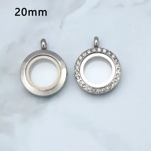 Close-up of 20mm round stainless steel magnetic lockets with crystal and smooth finishes