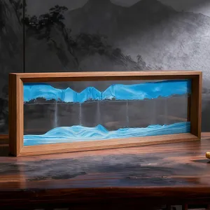 Vue détaillée de l'art du sable mouvant 3D dans un cadre en bois rectangulaire décoratif