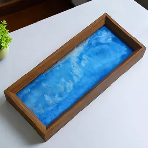 Vista superior de arte de arena movediza 3D en un marco de madera rectangular