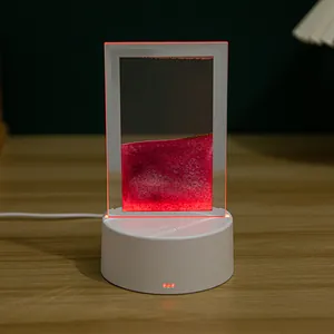 Detalle de primer plano de lámpara de arena movediza 3D con marco LED rojo brillante