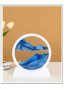 Elegant 3D moving sand art decor featuring blue mountain landscape in white circular frame