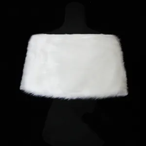 Close-up macro view showing the soft white faux fur texture of the elegant wedding shawl