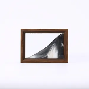 Arte creativo de arena móvil 3D con flujo blanco y negro en marco de madera minimalista