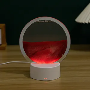 Lampada da notte creativa con arte della sabbia in movimento e luce rossa