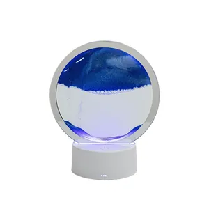 Lampada d'arte creativa con sabbia mobile blu e base LED bianca decor