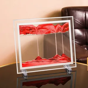 Quadro artistico con sabbia mobile rossa e cornice dinamica in 3D per scrivania
