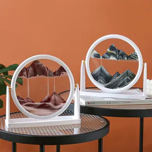 Decoración artística creativa de arena movediza en 3D con marco blanco redondo y montaña