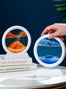 Nahaufnahme von runden 3D-Treibsandbildern mit komplexen orangefarbenen und blauen Mustern