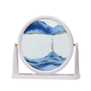 Decoración creativa de arte de arena movediza redonda con paisaje de montaña azul