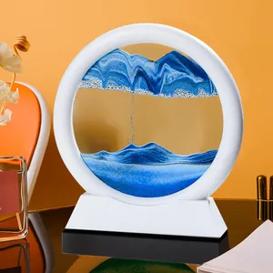 Elegante arte con sabbia mobile 3D con cornice bianca circolare e paesaggio blu dinamico