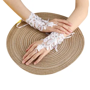 Elegant white lace bridal fingerless gloves with floral embroidery and sparkling sequins