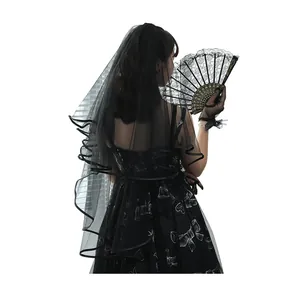 Vintage black double-layer wedding veil with satin edge and gothic lace fan accessory