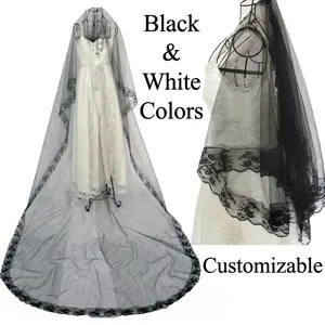 Detailed view of elegant long black lace wedding veil with floral edge embroidery