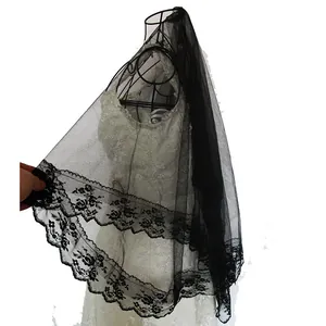 Detail of vintage black lace veil with floral embroidery for performance cosplay