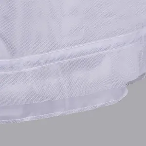 Detail shot of white multi-layer hard mesh petticoat hemline with fine stitching