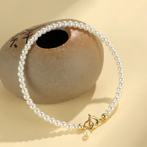 Elegant minimalist white pearl bracelet with gold-plated spring ring clasp