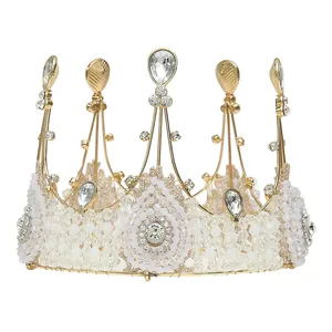 Elegant handmade white lace beaded gold queen crown for bridal wedding or cake decor.